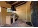 Outdoor kitchen with grill and granite countertops at 38749 N 104Th Way, Scottsdale, AZ 85262