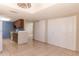 Open concept kitchen with a breakfast bar and view into dining area at 1972 S Clubhouse Dr, Casa Grande, AZ 85194