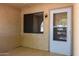 Front entry with tiled floor, screen door and window at 1972 S Clubhouse Dr, Casa Grande, AZ 85194
