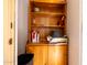 Small storage area with wooden shelving unit at 1972 S Clubhouse Dr, Casa Grande, AZ 85194