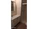 Bathroom with vanity, shower and tiled floor at 17255 N 66Th Dr, Glendale, AZ 85308