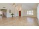 Open living room featuring tile floors and a high ceiling at 1247 E Marketplace Se Way, Phoenix, AZ 85048