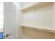Walk-in closet with double rods and shelving at 1247 E Marketplace Se Way, Phoenix, AZ 85048