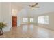 Spacious entryway with tile flooring and a wooden door at 1247 E Marketplace Se Way, Phoenix, AZ 85048