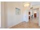 Bright dining area with tile floors and access to kitchen at 1247 E Marketplace Se Way, Phoenix, AZ 85048
