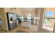 Kitchen with stainless steel appliances and island at 1247 E Marketplace Se Way, Phoenix, AZ 85048