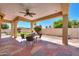 Covered patio with flagstone and backyard view at 1247 E Marketplace Se Way, Phoenix, AZ 85048
