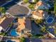 Aerial view of house with pool and surrounding neighborhood at 1247 E Marketplace Se Way, Phoenix, AZ 85048
