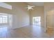Spacious bedroom with tile floors and patio access at 1247 E Marketplace Se Way, Phoenix, AZ 85048