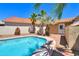 Relaxing pool area with palm trees and a spacious backyard at 1247 E Marketplace Se Way, Phoenix, AZ 85048