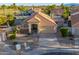 Single-story home with tile roof and desert landscaping at 1247 E Marketplace Se Way, Phoenix, AZ 85048