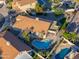 Aerial view of house with kidney shaped pool and backyard at 1247 E Marketplace Se Way, Phoenix, AZ 85048