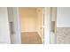 Small laundry room with tile floors and storage at 1247 E Marketplace Se Way, Phoenix, AZ 85048