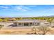 Back exterior with covered patio and mountain views at 16016 E Bobwhite Way, Scottsdale, AZ 85262