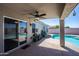 Relaxing pool area with covered patio and sliding glass doors at 4878 E Meadow Lark Way, San Tan Valley, AZ 85140