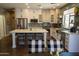 Modern kitchen with white cabinets, stainless steel appliances, and an island at 41417 N Clear Crossing Rd, Anthem, AZ 85086