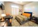 Spacious bedroom with a comfortable bed, large window, and ample space at 41417 N Clear Crossing Rd, Anthem, AZ 85086
