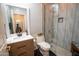 Updated bathroom with a walk-in shower, modern vanity, and stylish tile at 41417 N Clear Crossing Rd, Anthem, AZ 85086
