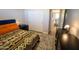 Bright bedroom featuring a queen-size bed and built-in workspace at 41417 N Clear Crossing Rd, Anthem, AZ 85086