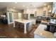 Modern kitchen with an island, stainless steel appliances, and granite countertops at 41417 N Clear Crossing Rd, Anthem, AZ 85086