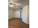 Spacious bedroom with hardwood floors and barn doors at 2300 E Concorda Dr, Tempe, AZ 85282