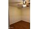 Charming bedroom with hardwood floors and wainscoting at 2300 E Concorda Dr, Tempe, AZ 85282