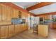 Kitchen with granite countertops and wood cabinets at 9818 N 17Th St, Phoenix, AZ 85020