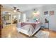 Bright bedroom with mirrored closet doors and light flooring at 9818 N 17Th St, Phoenix, AZ 85020