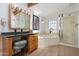 Bathroom with soaking tub, shower, and granite vanity at 9818 N 17Th St, Phoenix, AZ 85020