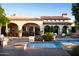 Spacious backyard with pool, patio, and lush landscaping at 10728 E Cottontail Ln, Scottsdale, AZ 85255