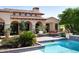 Stunning backyard with pool and Spanish-style architecture at 10728 E Cottontail Ln, Scottsdale, AZ 85255