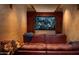 Home theater with leather seating and large screen at 10728 E Cottontail Ln, Scottsdale, AZ 85255