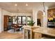 Kitchen with breakfast nook and french doors at 10728 E Cottontail Ln, Scottsdale, AZ 85255