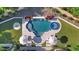 Aerial view of resort-style pool and spa; lush landscaping at 9926 E Kemper Way, Scottsdale, AZ 85255