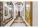 Grand hallway with high ceilings and artwork at 9926 E Kemper Way, Scottsdale, AZ 85255