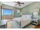 Bedroom with private balcony access and mountain views at 9926 E Kemper Way, Scottsdale, AZ 85255