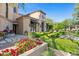 Charming patio with fountain and lush landscaping at 9926 E Kemper Way, Scottsdale, AZ 85255
