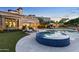 Circular spa adjacent to a rectangular pool at 9926 E Kemper Way, Scottsdale, AZ 85255