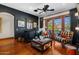 Cozy sitting room with a wet bar and access to a private balcony at 9926 E Kemper Way, Scottsdale, AZ 85255