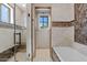 Bathroom with shower and soaking tub at 9926 E Kemper Way, Scottsdale, AZ 85255