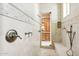Elegant bathroom with double shower heads and a built-in bench at 9926 E Kemper Way, Scottsdale, AZ 85255