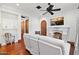 Bright sitting area with fireplace, built-in shelving, and hardwood floors at 9926 E Kemper Way, Scottsdale, AZ 85255