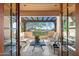 Relaxing patio with pergola and comfortable seating at 9926 E Kemper Way, Scottsdale, AZ 85255