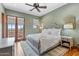 Bedroom with private balcony access and mountain views at 9926 E Kemper Way, Scottsdale, AZ 85255