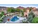 Resort-style pool and spa with lush landscaping at 9926 E Kemper Way, Scottsdale, AZ 85255