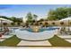 Resort-style pool and spa with fire feature and ample lounge space at 9926 E Kemper Way, Scottsdale, AZ 85255