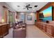 Luxurious home theater with comfortable seating and large screen at 9926 E Kemper Way, Scottsdale, AZ 85255