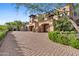 Brick driveway leads to this stunning home's garage at 9926 E Kemper Way, Scottsdale, AZ 85255