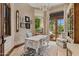 Spacious home office with built-in desk and French doors at 9926 E Kemper Way, Scottsdale, AZ 85255