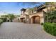View of the home's double garage doors at 9926 E Kemper Way, Scottsdale, AZ 85255